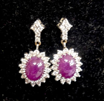 Lot 2070 - A pair of 18ct yellow and white gold, ruby and...