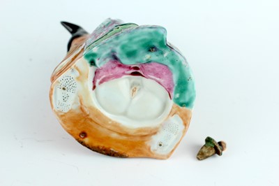 Lot 132 - A Chinese famille rose erotic teapot, late...