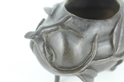 Lot 70 - A Chinese ‘finger-citron’ bronze incense...