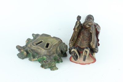 Lot 44 - A Chinese lacquered wooden figure of a deity,...