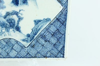 Lot 8 - A Chinese blue and white landscape plaque,...