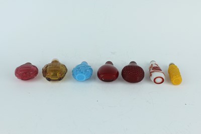 Lot 29 - A group of seven Chinese glass snuff bottles,...