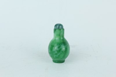 Lot 34 - A Chinese jadeite snuff bottle, 20th century...