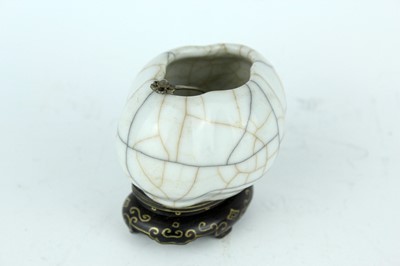 Lot 94 - A Chinese Ge-type water pot with a small ladle,...