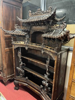 Lot 264 - A Chinese carved and pierced 'rosewood' pagoda...