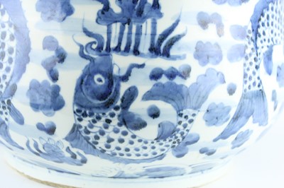 Lot 173 - A large Chinese blue and white fish bowl, 20th...