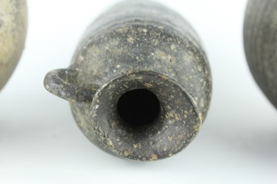 Lot 118 - Five Chinese black-glazed stoneware vessels,...