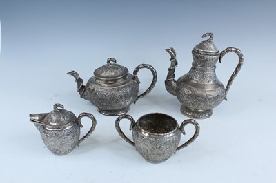 Lot 159 - A set of four Chinese export silver tea sets,...