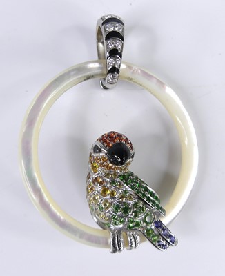 Lot 2262 - A gem set mother of pearl and diamond pendant,...