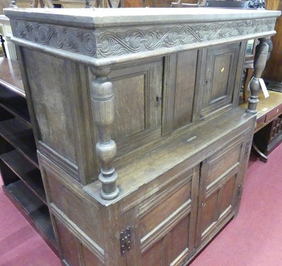 Lot 1322 - A joined oak court cupboard, width 127cm