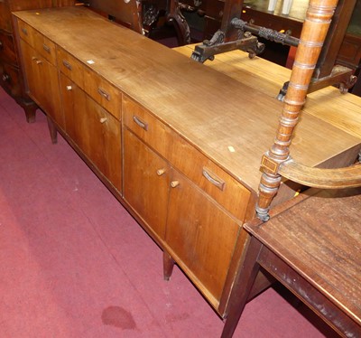 Lot 1177 - A 1960s McIntosh teak long sideboard, the...