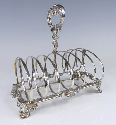 Lot 2198 - An early Victorian silver six division toast...