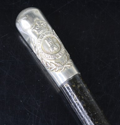 Lot 714 - A swagger stick, having an ebonised shaft and...