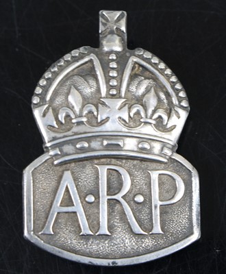 Lot 578 - A WW II silver A.R.P. lapel badge, maker J.C....