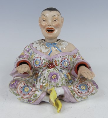 Lot 2048 - A circa 1900 continental porcelain nodding...