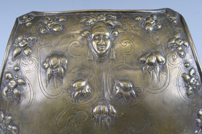 Lot 91 - A decorative cast brass breast plate, embossed...