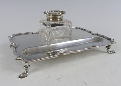 Lot 2199 - A George V silver inkstand of shaped...