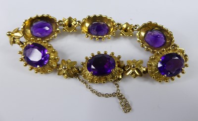 Lot 2275 - A yellow metal amethyst Etruscan-style line...