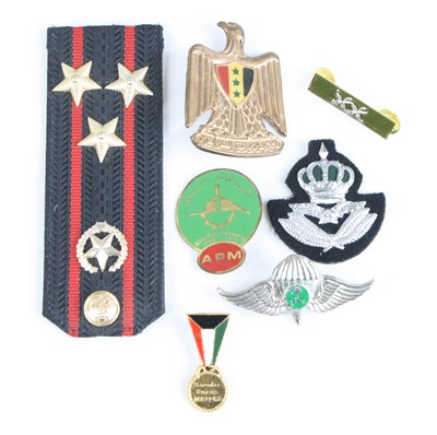 Lot 325 - A small collection of assorted military and...