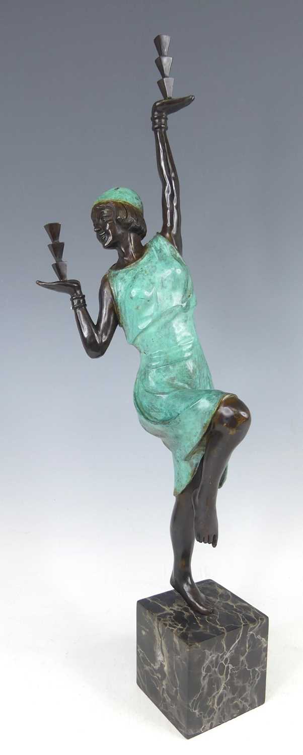 Lot 68 - A Large patinated bronze standing figure, in...