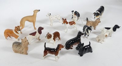 Lot 71 - A collection of Beswick figures of dogs, to...