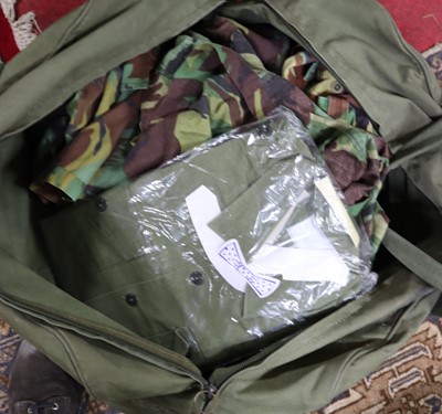 Lot 1618 - Military kit bag with various clothing and...