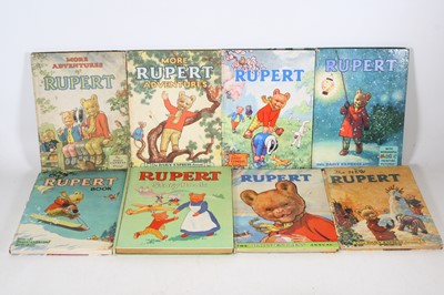 Lot 581 - Collection of 8 Rupert the Bear Annuals, to...