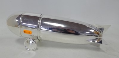 Lot 543 - A novelty reproduction cocktail shaker in the...