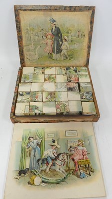Lot 563 - An early 20th century children's block puzzle,...