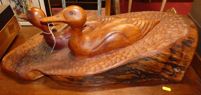 Lot 1337 - A carved and stained hardwood model titled...