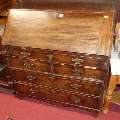 Lot 1341 - An early 19th century mahogany slopefront...
