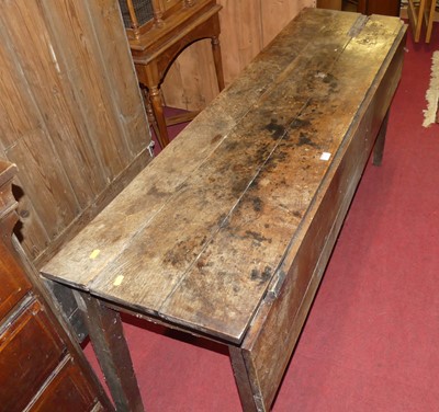 Lot 1365 - A provincial oak drop flap long supper table,...