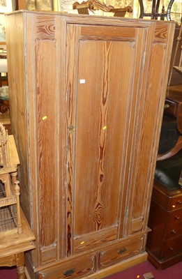Lot 1369 - A late Victorian pitch pine single door...