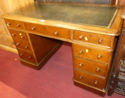 Lot 1372 - A late Victorian oak round cornered twin...