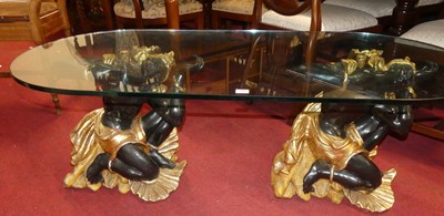 Lot 1401 - A contemporary plate glass topped low...