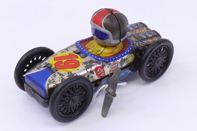 Lot 480 - Yonezawa tinplate and clockwork model of a...