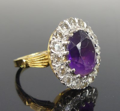 Lot 2541 - A yellow and white metal amethyst and diamond...