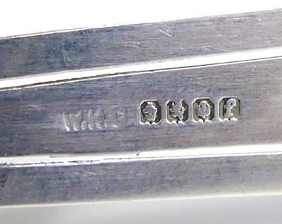 Lot 1 - A collection of four early 20th century silver...