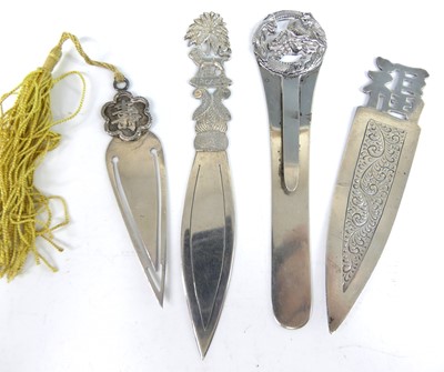 Lot 28 - A collection of four Far Eastern silver clip...