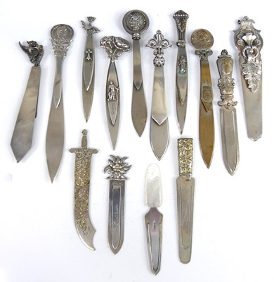 Lot 2 - A collection of EPNS and white metal clip...