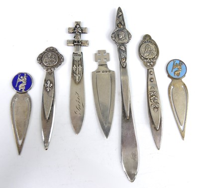 Lot 18 - A late Victorian silver clip bookmark topped...