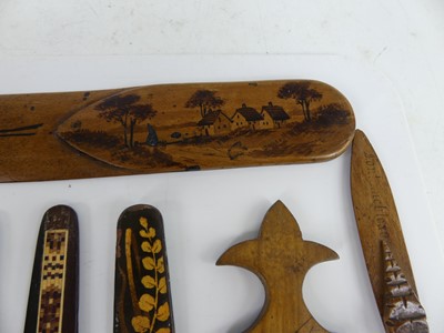 Lot 42 - A collection of carved olive and other wooden...