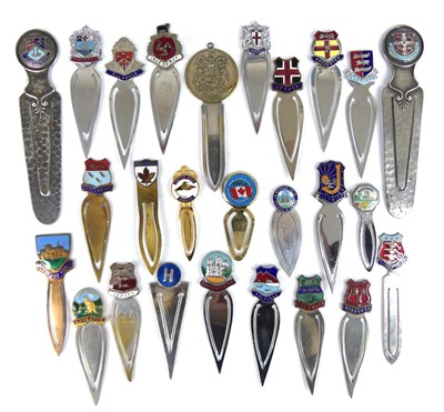Lot 22 - A collection of metal and EPNS souvenir clip...
