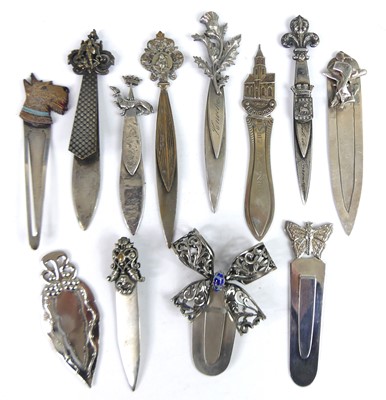 Lot 33 - A collection of white metal decoratively...