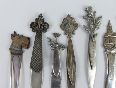 Lot 33 - A collection of white metal decoratively...