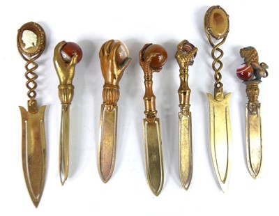 Lot 58 - A collection of Victorian hardstone topped...