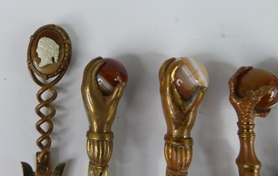 Lot 58 - A collection of Victorian hardstone topped...