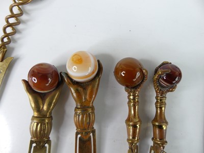 Lot 58 - A collection of Victorian hardstone topped...