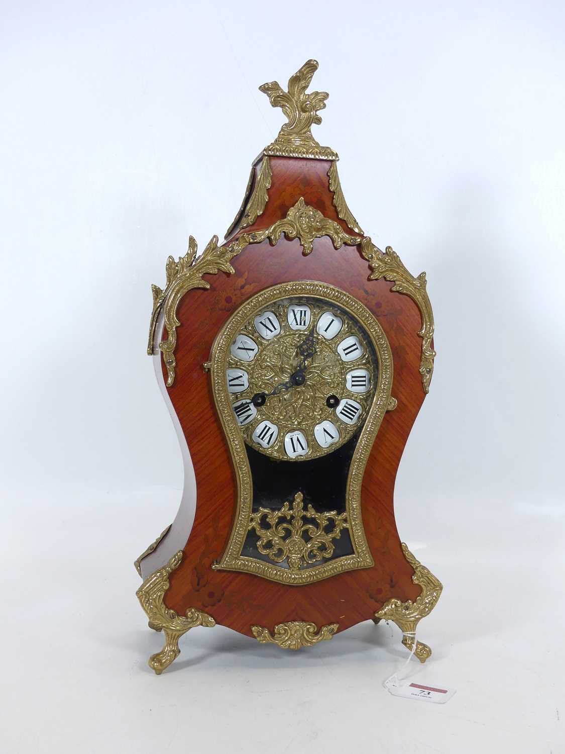 Lot 73 - A reproduction kingwood and marquetry mantel...