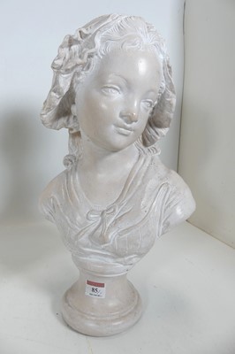 Lot 85 - A painted stoneware bust of a young girl,...